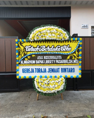 Papan Bunga Duka di Naimata